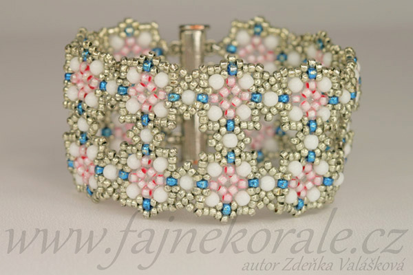Rokajl Preciosa 10/0 (2,2 - 2,4 mm) RH, bal. 50 g - krystal s růžovo-bílým pr., large hole