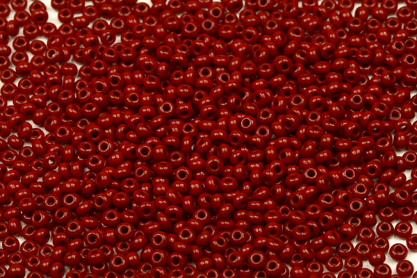 PRECIOSA rokajl 10/0 (2,2 - 2,4 mm) RH, bal. 50 g - sytá tmavá korálově červená