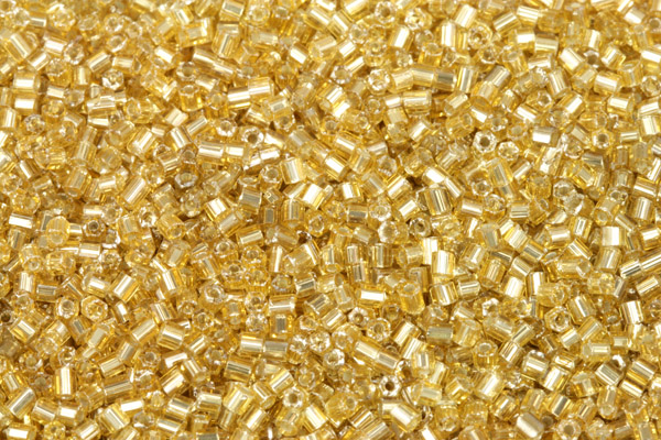 PRECIOSA™ dvoukrátky (2cuts) 10/0 (2,0 - 2,2 mm) RH, bal. 50 g - světlý topaz, SL (zlatá)
