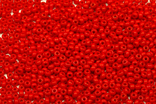 Rokajl Preciosa 10/0 (2,2 - 2,4 mm) RH, bal. 50 g - sytá korálově červená