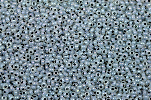 Rokajl Preciosa 10/0 (2,2 - 2,4 mm) RH, bal. 50 g - alabastr, šedý vtah, rainbow