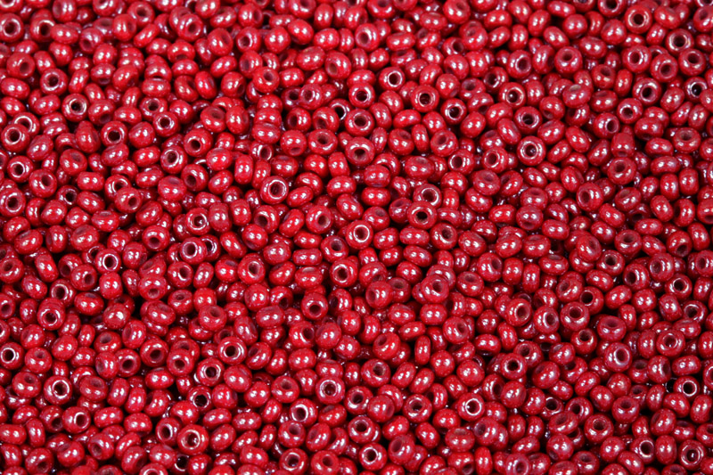 PRECIOSA rokajl 10/0 (2,2 - 2,4 mm) RH, bal. 50 g - sytá červená s listrem, sfinx