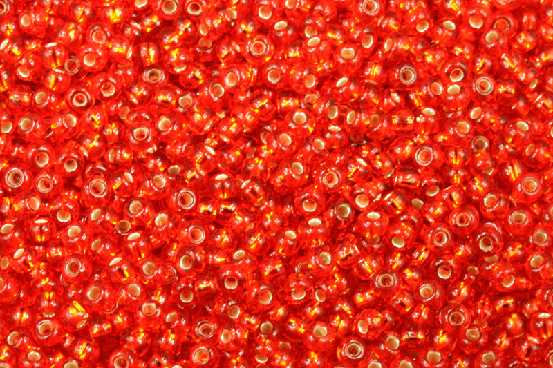 Rokajl Preciosa 8/0 (2,8 - 3,2 mm) RH, bal. 50 g - transp. oranžová, SL