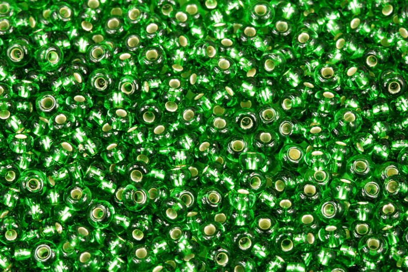 Rokajl Preciosa 6/0 (3,7 - 4,3 mm) RH, bal. 50 g - transp. chrysolitově zelená, SL