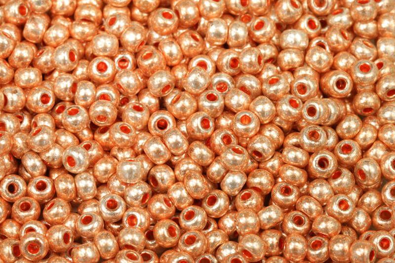 Rokajl Preciosa 6/0 (3,7 - 4,3 mm) RH, bal. 50 g - metalická světle oranžovozlatá