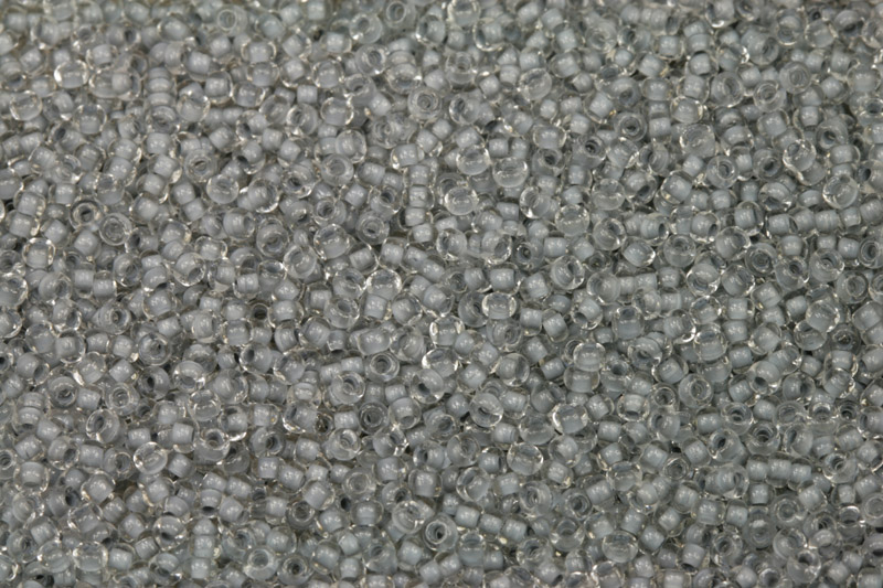 TOP Rokajl Preciosa 10/0 (2,2 - 2,4 mm) RH, bal. 50 g - krystal, šedý průtah (38342)