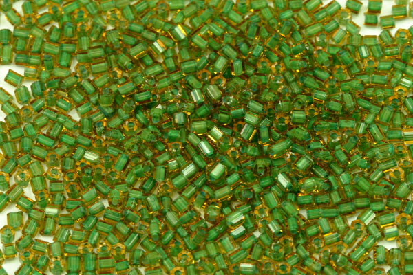 PRECIOSA dvoukrátky (2cuts) 10/0 (2,0-2,2 mm) RH, bal. 50 g - topaz se zeleným průtahem