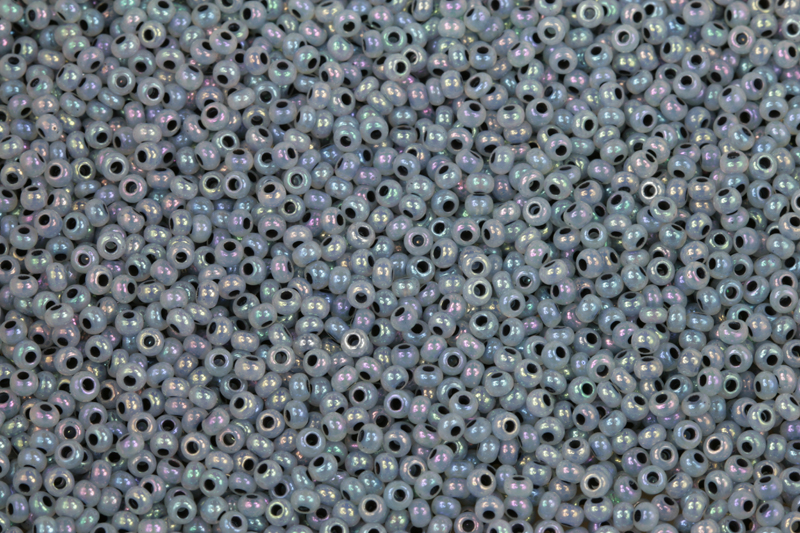 TOP Rokajl Preciosa 10/0 (2,2 - 2,4 mm) RH, bal. 50 g - alabastr, šedý vtah, rainbow 57549