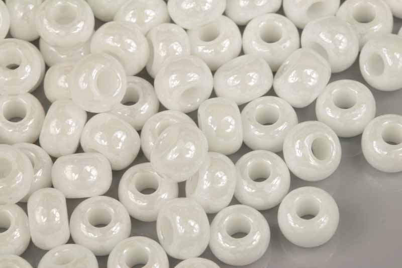 PRECIOSA rokajl 34/0 (8,3 - 8,8 mm) RH, bal. 50 g - sytá bílá s listrem, sfinx