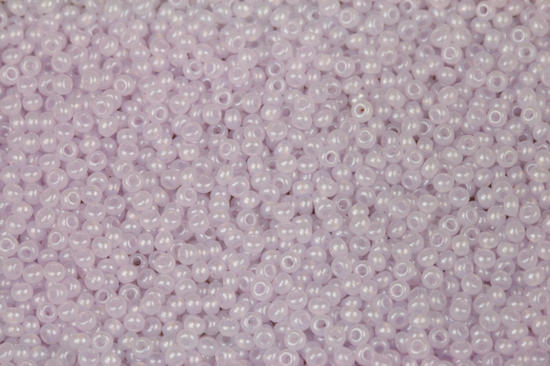 Rokajl Preciosa 10/0 (2,2 - 2,4 mm) RH, bal. 50 g - světl. fialový (lila) solgel na alab.