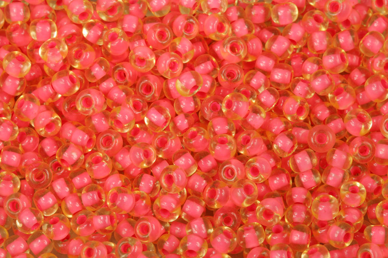 Rokajl Preciosa 6/0 (3,7 - 4,3 mm) SH, bal. 50 g - transp. žlutá s růžovým průtahem