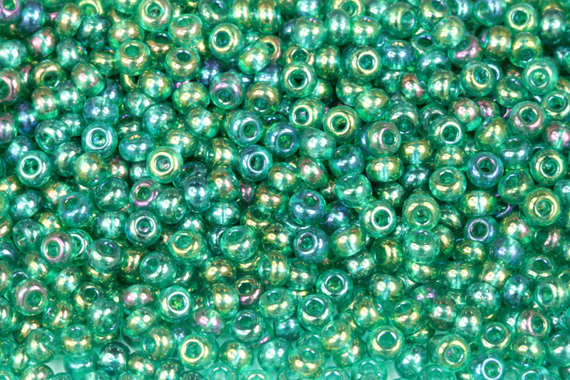 Rokajl Preciosa 6/0 (3,7 - 4,3 mm) RH, bal. 50 g - transparentní zelená, rainbow
