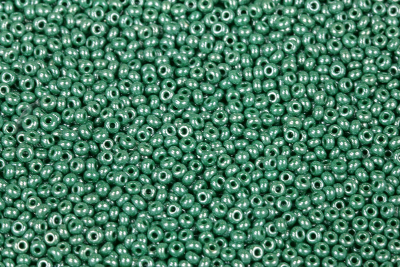 PRECIOSA rokajl 10/0 (2,2 - 2,4 mm) RH, bal. 50 g - sytá tmavší zelená, sfinx