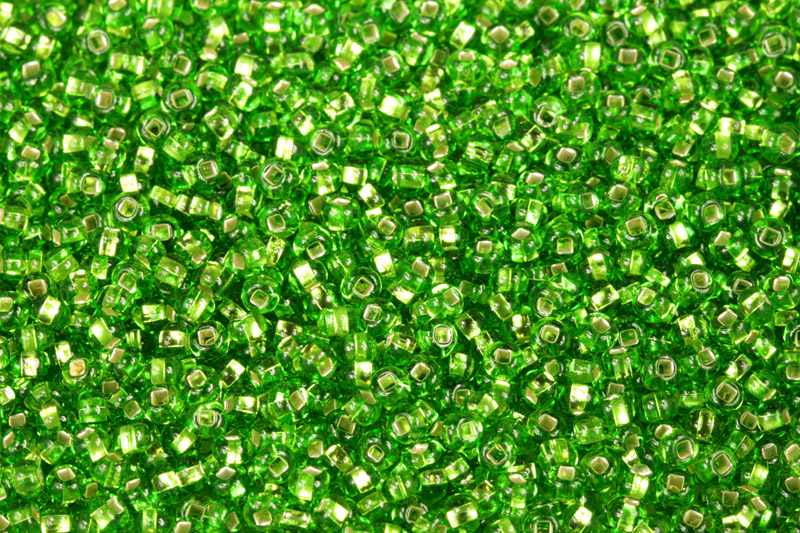 Rokajl Preciosa 8/0 (2,8 - 3,2 mm) SH, bal. 50 g - transp. zelená peridot, SL