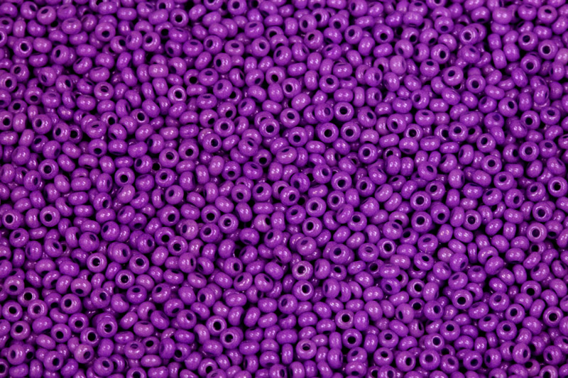PRECIOSA rokajl 10/0 (2,2 - 2,4 mm) RH, bal. 50 g - fialová, solgel na křídě