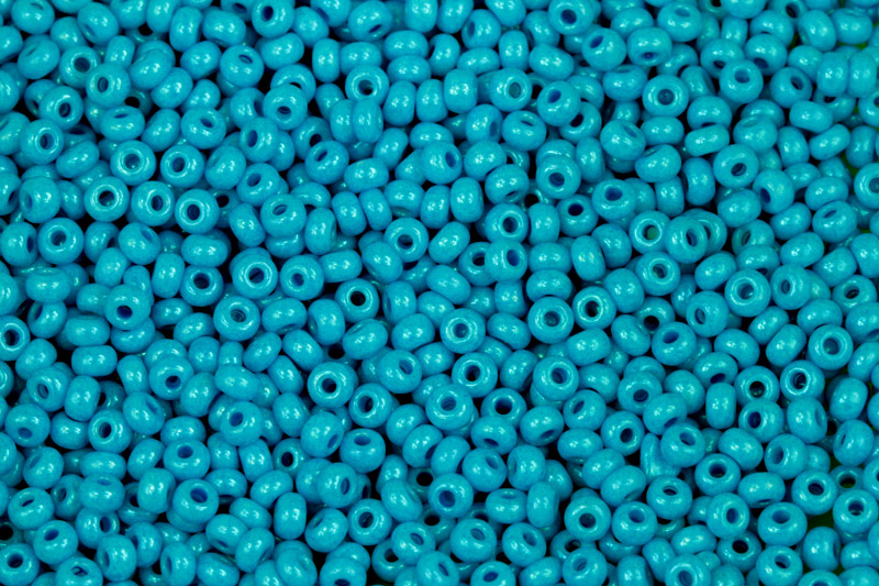 PRECIOSA rokajl 6/0 (3,7 - 4,3 mm) RH, bal. 50 g - sytý tyrkysově modrý listr