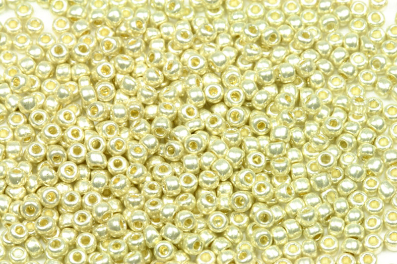 PRECIOSA rokajl 8/0 (2,8 - 3,2 mm) RH, bal. 50 g - metalická zlatostříbrná, světlá zlatá