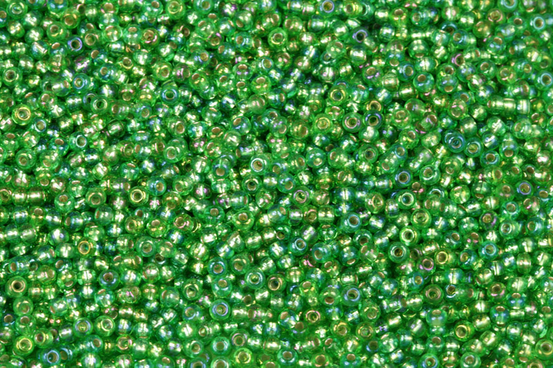 PRECIOSA rokajl 11/0 (2,0 - 2,2 mm) RH, bal. 50 g - transp. zelená, rainbow, SL