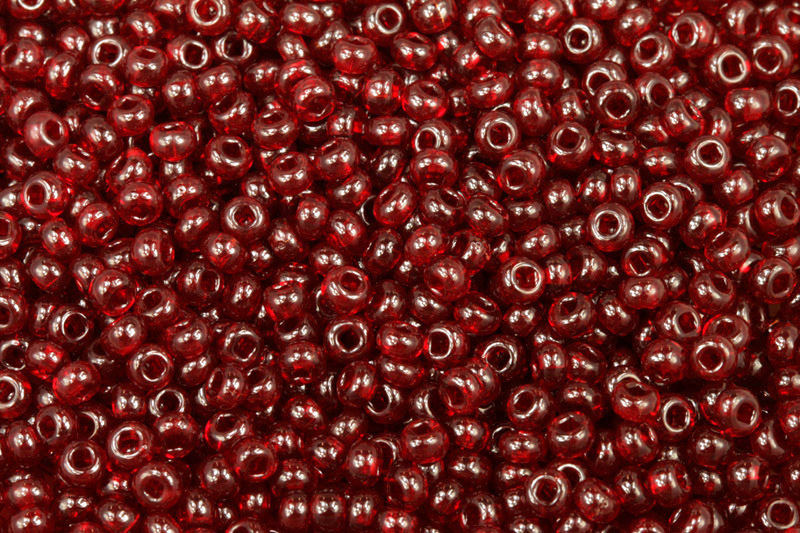PRECIOSA rokajl 7/0 (3,2 - 3,7 mm) RH, bal. 50 g - transparentní rubínově červená