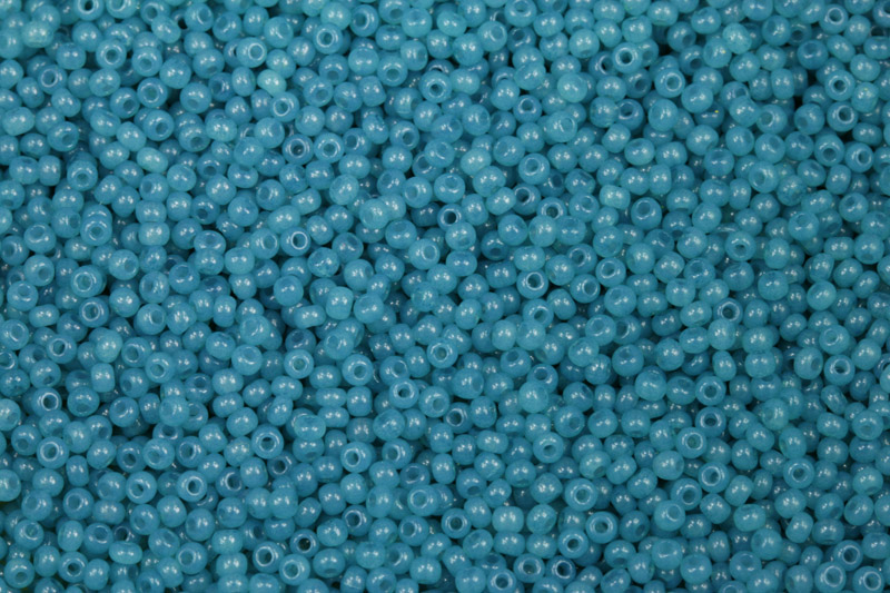 PRECIOSA rokajl 11/0 (2,0 - 2,2 mm) RH, bal. 50 g - zelenomodrá na alabastru, solgel