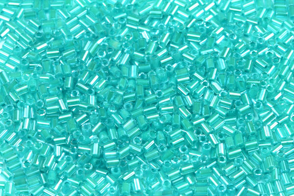 PRECIOSA Bugles-RH, rovné čípky 1" (2,3 mm), bal. 50 g - krystal modrozelený průtah, sfinx