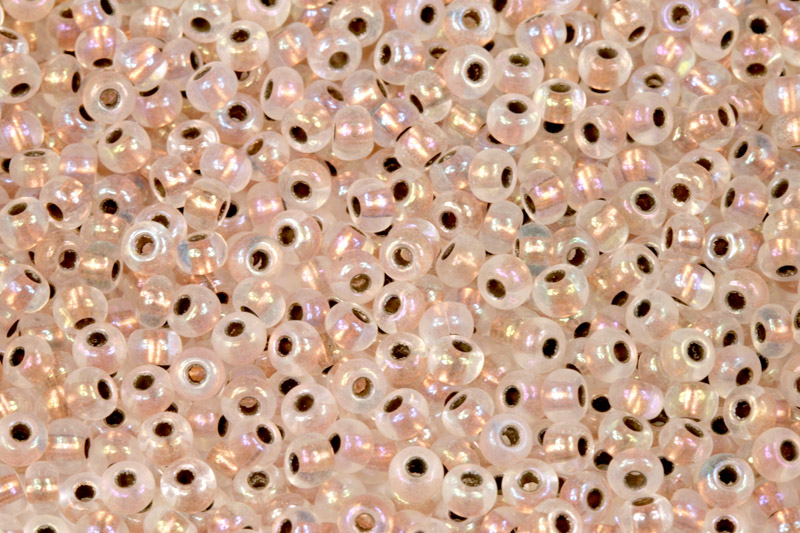 PRECIOSA rokajl 6/0 (3,7 - 4,3 mm) RH, bal. 50 g - krystal, rainbow, metalický vtah