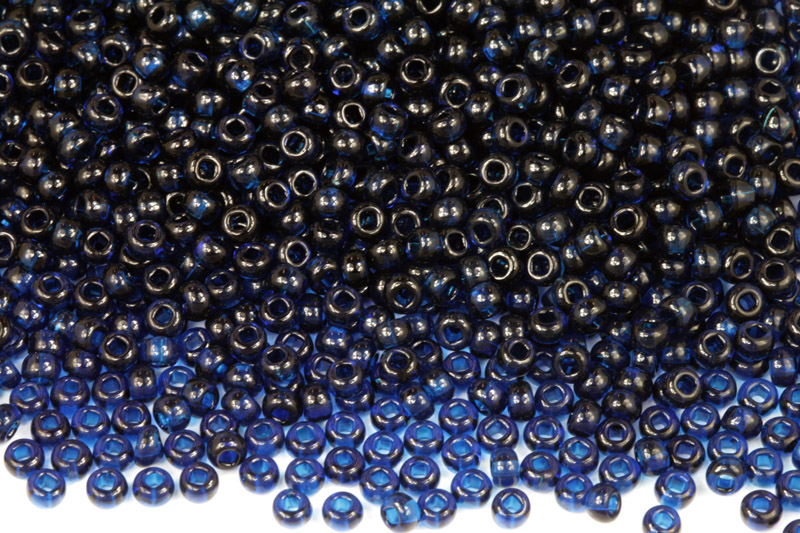 PRECIOSA rokajl 8/0 (2,8 - 3,2 mm) RH, bal. 50 g - transp. tmavý akvamarín, modrá