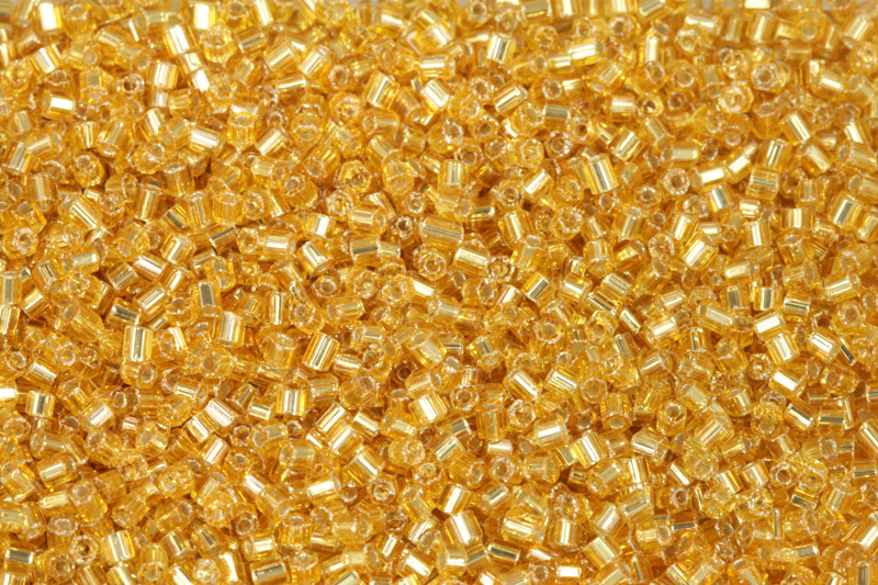 PRECIOSA dvoukrátky (2cuts) 11/0 (1,8-2,0 mm) RH, bal. 50 g - transp. topaz, SL(zlatá)