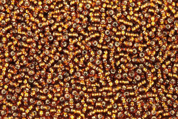 PRECIOSA rokajl 11/0 (2,0 - 2,2 mm) RH, bal. 50 g - transp. hnědý topaz, SL