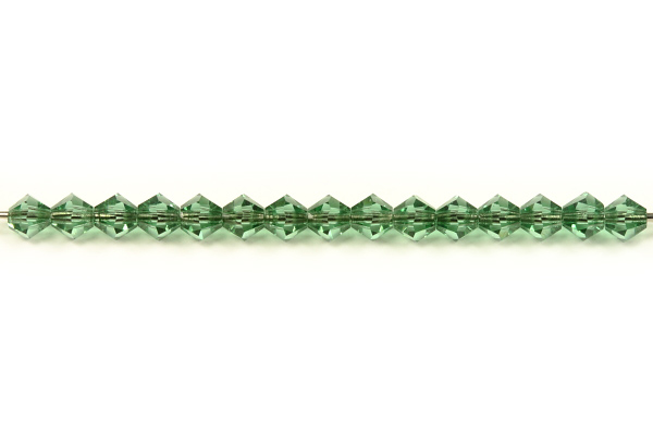 M.C. sluníčka (bicone) 4 mm, 36 ks - transp. turmalínově zelená