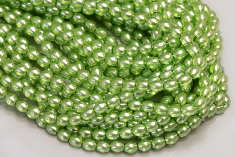 Voskované korálky olivy 4x3 mm, 1 šňůra/120 ks - světle zelená, semitransparent