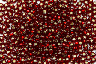 PRECIOSA rokajl 8/0 (2,8 - 3,2 mm) SH, bal. 50 g - transp. tmavě rubínově červená, SL