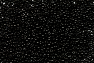 PRECIOSA rokajl 10/0 (2,2 - 2,4 mm) RH, bal. 50 g - sytá černá