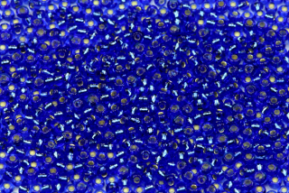 PRECIOSA rokajl 9/0 (2,4 - 2,8 mm) RH, bal. 50 g - transp. safírově modrá, SL