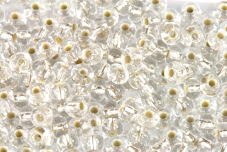 PRECIOSA rokajl 2/0 (5,8 - 6,3 mm) RH, bal. 50 g - krystal se stříbrným průtahem, SL