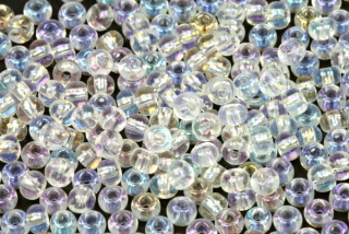 PRECIOSA rokajl 6/0 (3,7 - 4,3 mm) RH, bal. 50 g - krystal, rainbow