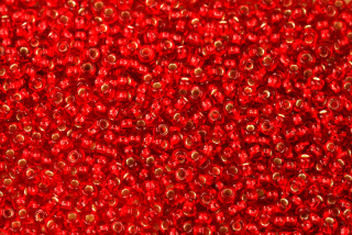 PRECIOSA rokajl 8/0 (2,8 - 3,2 mm) RH, bal. 50 g - transp. rubínově červená, SL