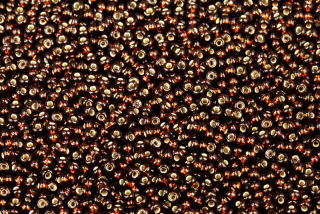 PRECIOSA rokajl 11/0 (2,0 - 2,2 mm) RH, bal. 50 g - transp. tmavý topaz (hnědá), SL