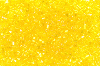 PRECIOSA dvoukrátky (2cuts) 11/0 (1,8-2,0 mm) RH, bal. 50 g - transp. žlutá, rainbow