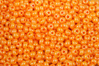 Rokajl Preciosa 6/0 (3,7 - 4,3 mm) SH, bal. 50 g - sytá oranžová s listrem, sfinx