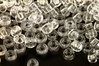 PRECIOSA rokajl 1/0 (6,3 - 6,8 mm) RH, bal. 50 g - čirá, krystal