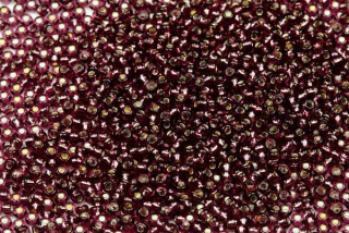 PRECIOSA rokajl 10/0 (2,2 - 2,4 mm) RH, bal. 50 g - transp. tmavší ametystově fialová, SL