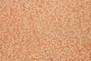 PRECIOSA rokajl 11/0 (2,0 - 2,2 mm) RH, bal. 50 g - krystal, oranžový vtah