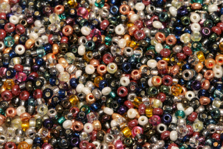 PRECIOSA rokajl MIX 9/0 (2,4 - 2,8 mm), bal. 50 g - různobarevný mix