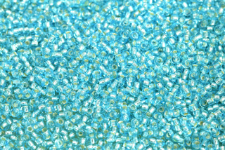 PRECIOSA rokajl 10/0 (2,2 - 2,4 mm) RH, bal. 50 g - transp. světle akvamarínově modrá, SL
