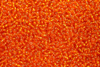 PRECIOSA rokajl 10/0 (2,2 - 2,4 mm) RH, bal. 50 g - transp. oranžová hyacint, SL