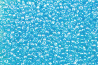 PRECIOSA rokajl 8/0 (2,8 - 3,2 mm) RH, bal. 50 g - transp. akvamarínově modrá, sfinx