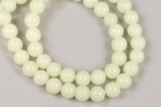 Minerální korálky - kulička 8 mm, 1 ks - svítící ve tmě, světle žluté (slonová kost)