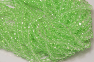 Broušené korálky slavík 3x2 mm, cca 145 ks na šňůře 36 cm - transp. světle zelená