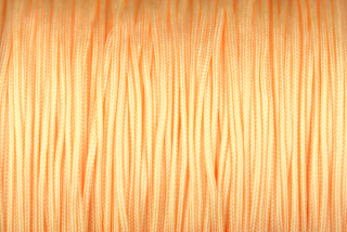 Nylonová šňůrka vázací, průměr 0,8 mm, metráž 1 m - světlá lososově oranžová